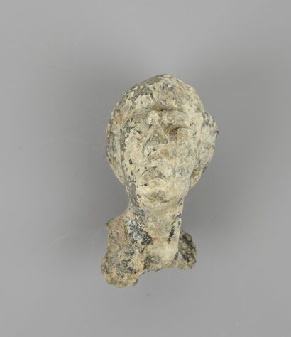 null Head of young man ephebe lead decorated

4,5 cm

Roman period, first century...