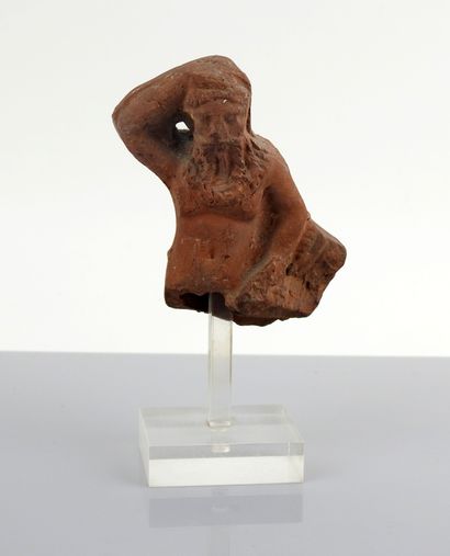 null Important statuette representing a bearded man (silene?) leaning on a structure

Terracotta...