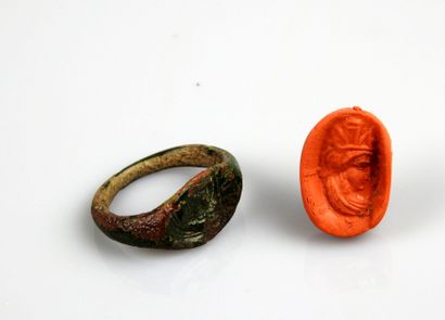 null Ring with recessed decoration representing Tyche, recognizable by his mural...