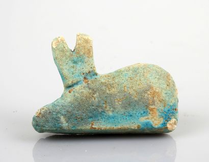 null Amulet of very large size representing an animal, the ears drawn up

Frit 6...