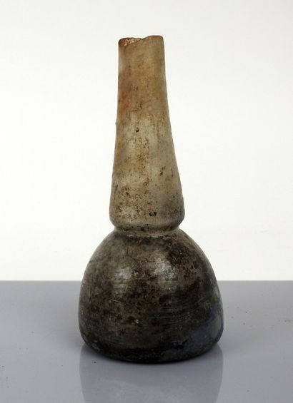 Large bottle with piriform body and long...