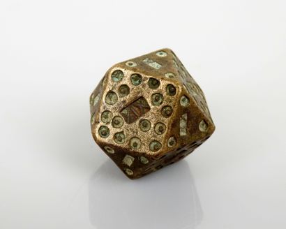 null Fourteen sided dice decorated with ocelli and number XIX

Brass 2 cm

XIXth...
