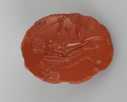 null Intaglio representing a naked man

Red jasper 2 cm chips

Roman period