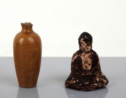 null Asie

Ensemble de 4 éléments comprenant un bouddha, deux vases en bois, et un...