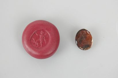 null Intaille gravée d’un jeune homme et un chien

Agate 1.2 cm

Epoque romaine