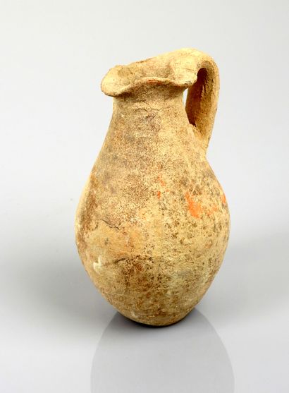 null Pitcher with handle

Pink terracotta 12 cm

Roman period