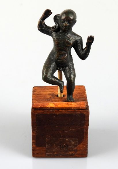 null Statuette representing Horus Harpocrates dancing with the wick of childhood...