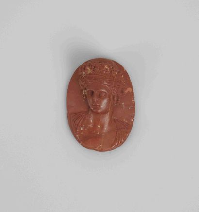 null Cameo with a female bust

Jasper 4 cm

Veins in the stone and small chips on...