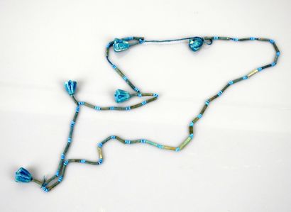 null An Egyptian style frit and glass paste necklace

About 25 cm