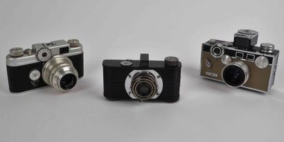 null Set of three cameras: Argus A, C3 Matchmatic and C-Four.