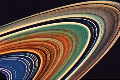null Interplanetary. Colored view of the rings of Saturn discovered in 1979 by the...