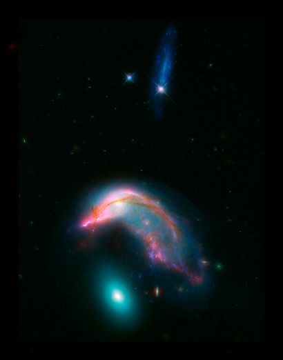 null NASA. LARGE FORMAT. DEEP SPACE. This photographic image of two distant interacting...