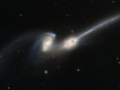 null NASA. LARGE FORMAT. HUBBLE TELESCOPE. Deep observation of two galaxies in fusion....