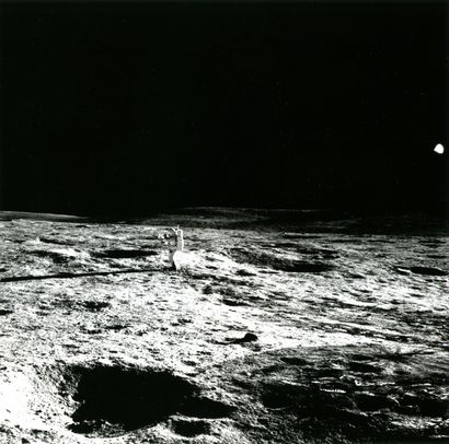 null Nasa. Apollo 14. Astronaut Edgard Mitchel walks alone a long distance away from...