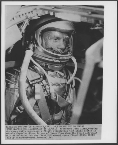 NASA. Astronaut JOHN GLENN in his capsule...