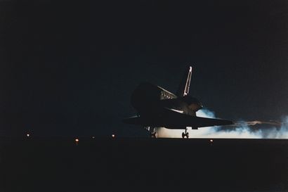 null NASA. A perfect night view of the space shuttle landing on Runway 15 at Kennedy...