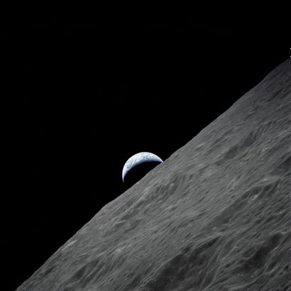 null Nasa. Apollo 17 mission. Spectacular crescent of the Earth rising above the...