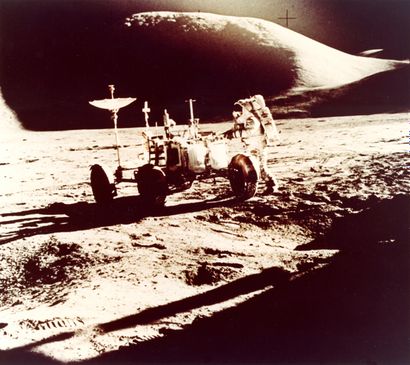 null Nasa. Apollo 15. James Irvin and the Rover in front of Mount Hadley. July 1971....