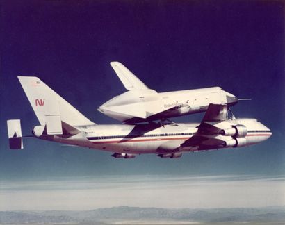 null Rare view of the space shuttle Enterprise carried in flight by its special Boeing...