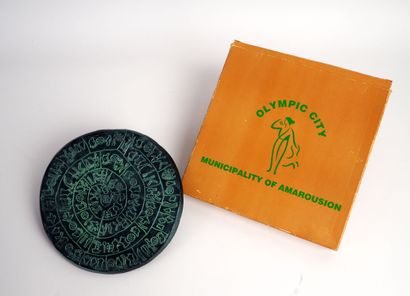 null Olympic Games/Athens, summer 2004. Replica of ancient disc offered to journalists....