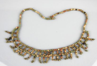null Mummiform necklace with double row

Frit 49 cm

Egypt Late Period
