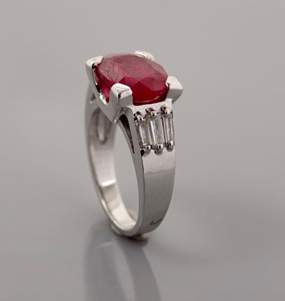 null Ring in white gold, 750 MM, set with an oval treated ruby weighing about 5 carats...