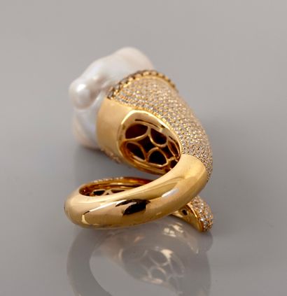 null Ring "jewel of artist" drawing a stylized cornucopia in yellow gold, 750 MM,...