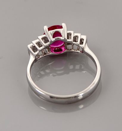 null Ring in white gold, 750 MM, set with an oval ruby weighing 1.50 carat approximately,...