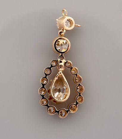 null Neoclassical" pendant in yellow gold, 750 MM, set with two round diamonds bearing...