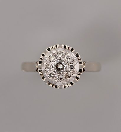 null Ring in white gold, 750 MM, covered with diamonds simulating a central stone...