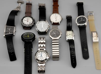 null "A lot of modern designer watches in steel and metal, with quartz movements,...