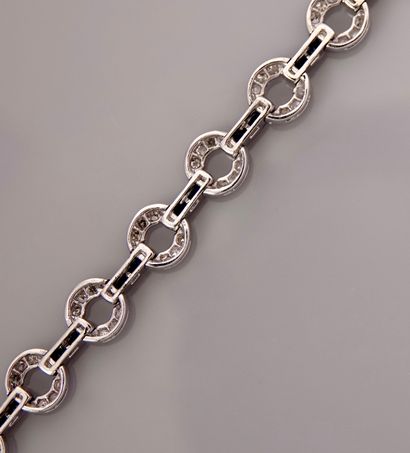 null Bracelet in white gold, 750 MM, formed of lozenges covered with diamonds total...