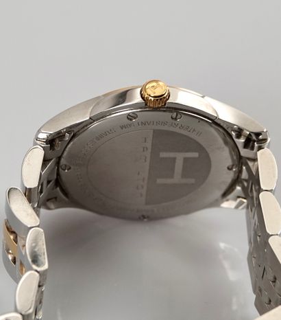 null 
"Hamilton

Mixed watch in steel and gold plated with quartz movement.

- Round...
