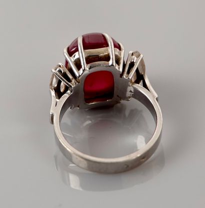 null Ring in white gold 750MM and, platinum 900 MM, decorated with a cabochon ruby...