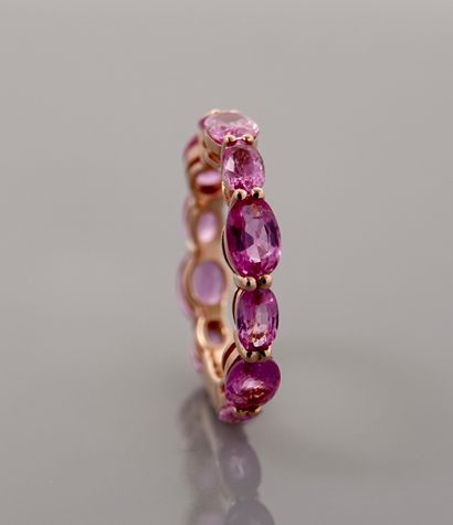 null Pink gold wedding band, 750 MM, highlighted with oval and navette pink sapphires,...