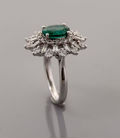 null Pompadour ring in white gold, 750 MM, centered on an oval translucent emerald...
