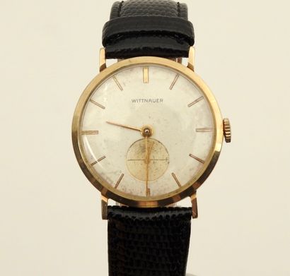null "Wittnauer

Gold-plated dress watch with mechanical movement.

- Round gold-plated...