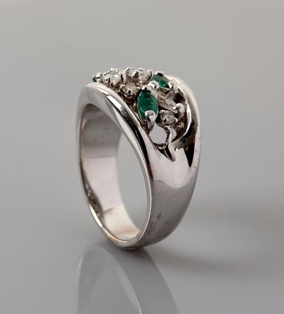null Band ring in white gold, 750 MM, studded with diamonds and emeralds navette...