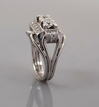 null Ring in white gold 750MM and, platinum 900 MM, decorated with two very white...