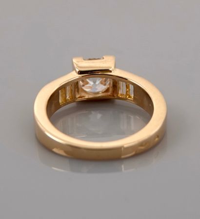 null Yellow gold solitaire ring, 750 MM, set with a diamond weighing 0.80 carat set...
