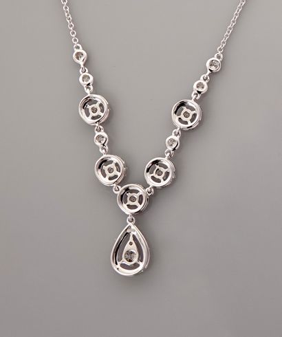 null Necklace Drapery in white gold, 750 MM, decorated with six round diamond motifs...