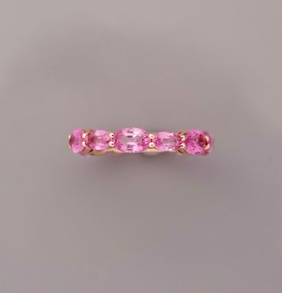 null Pink gold wedding band, 750 MM, highlighted with oval and navette pink sapphires,...