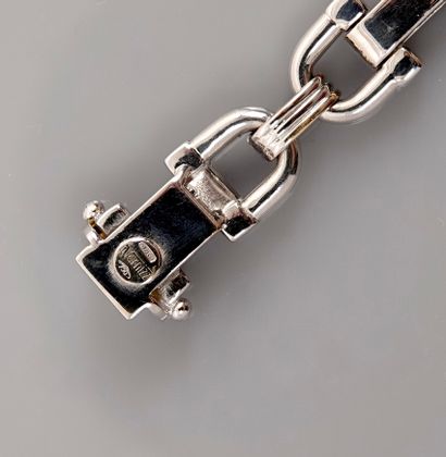 null Bracelet mixte dessinant une succession d'étriers en or gris, 750 MM, liés par...