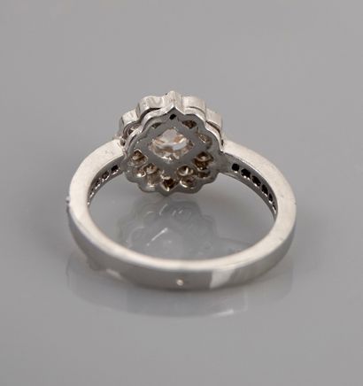 null White gold Fleurette ring, 750 MM, covered with diamonds, center 0,51 carat,...