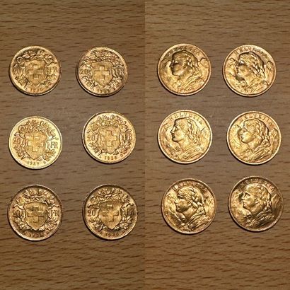 null 
6 pièces de 20 francs suisses or dont 1935 ( x 5) et 1927 (x1)

Poids 38,76...