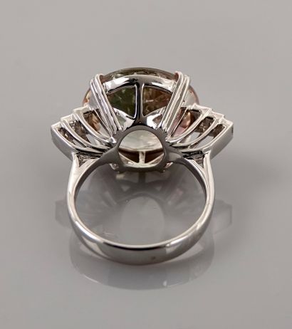 null Ring in white gold, 750 MM, set with a pale tourmaline, round weighing 11 carats...