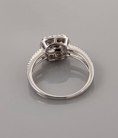 null Ring with square plate of white gold, 750 MM, covered with diamonds on two levels...