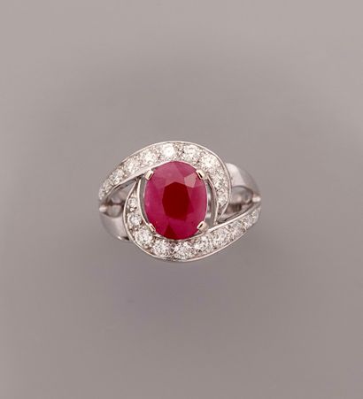 null White gold ring, 750 MM, set with an oval ruby weighing 2.61 carats certified...