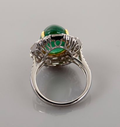 null White gold ring, 750 MM, centered on a cabochon emerald weighing 8.50 carats...