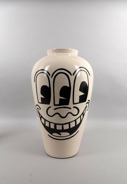 null Keith Haring, after
Glazed terra cotta vase with a marker drawing, signed and...
